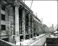 Scaffolding can be seen around some of the pillars that make up the main entrance during the construction of Union Station.