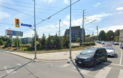 Millwood Road and Laird Drive with right turn channel removed.